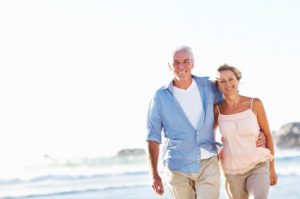 Retired Couple on Beach Long Term Care Insurance
